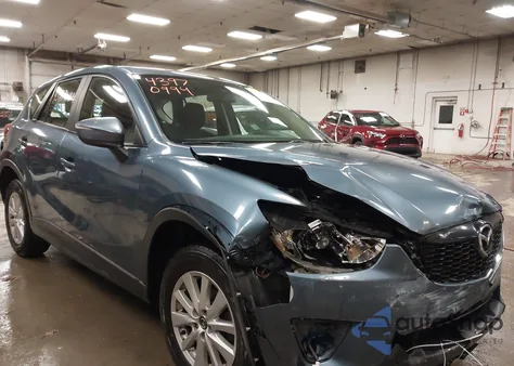 2015 Mazda Cx-5 Sport from USA, damaged, VIN JM3KE4BY5F0511417